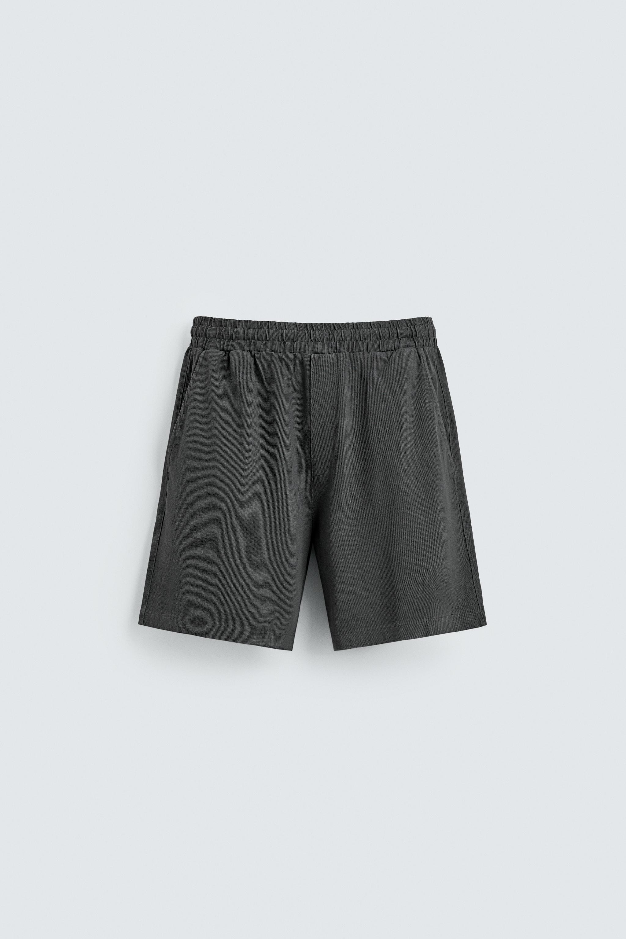WASHED REGULAR FIT PIQUÉ SHORTS